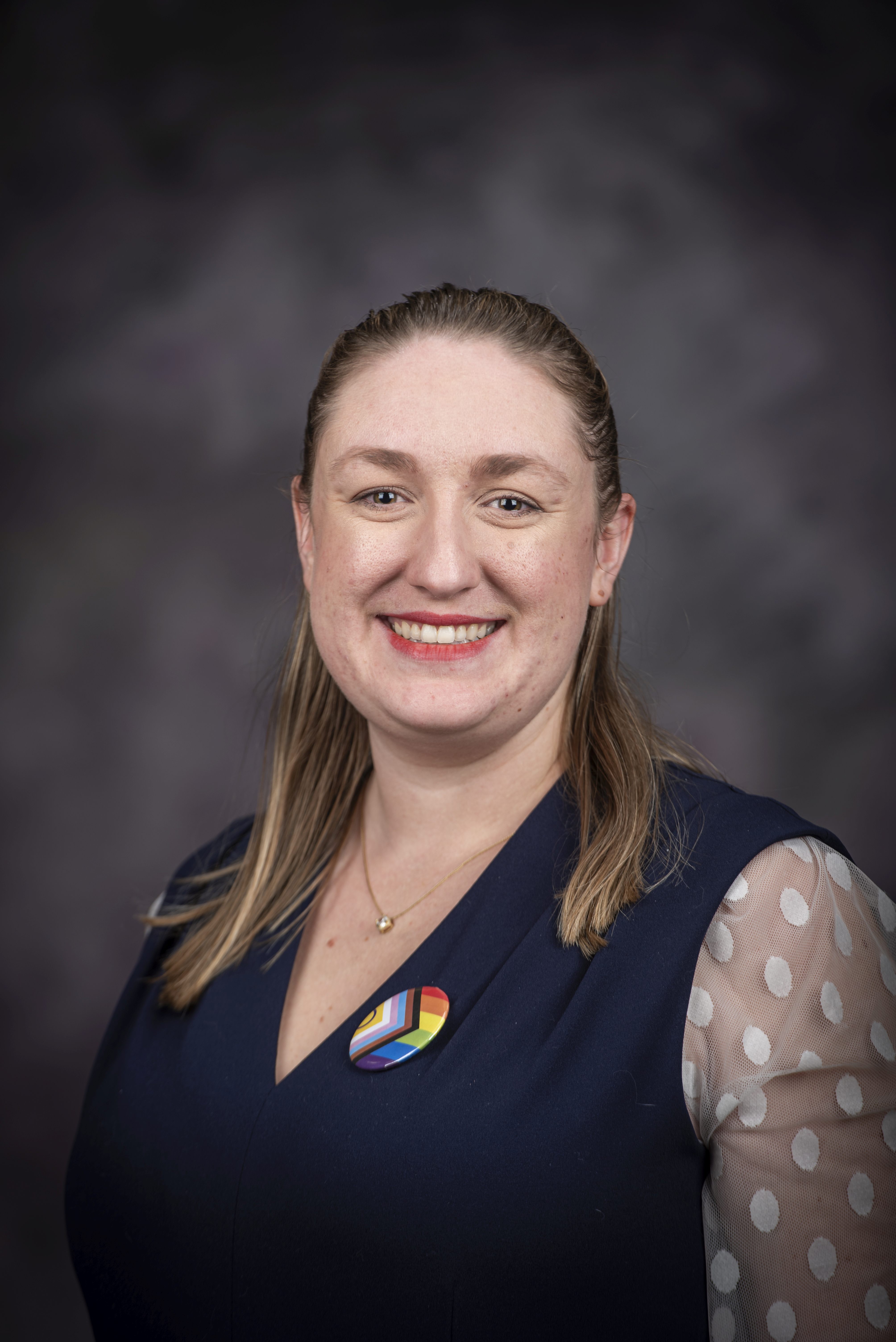 beautiful woman smiling in navy top