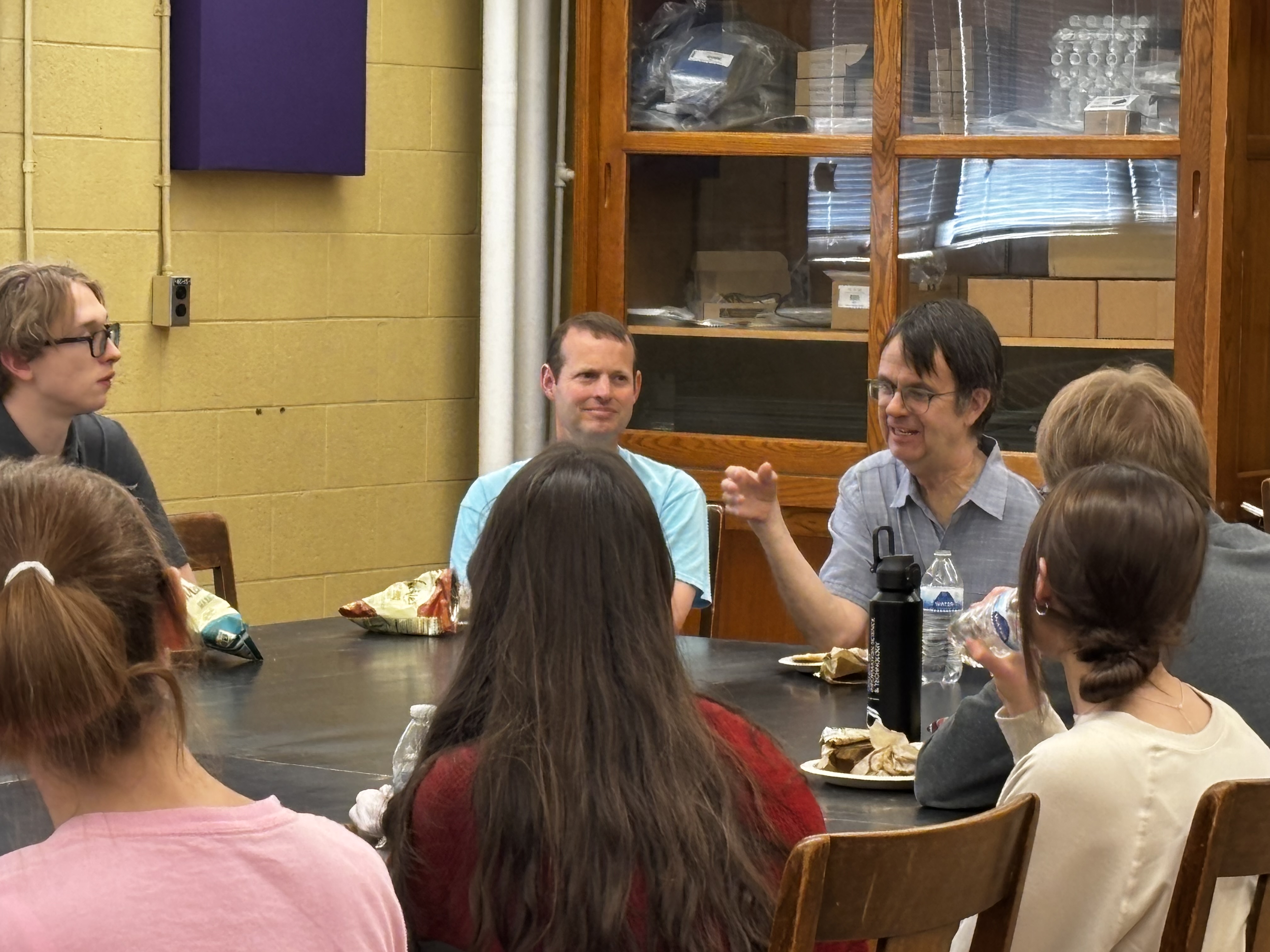 Eric Cornell with student visitors at STEM experience day